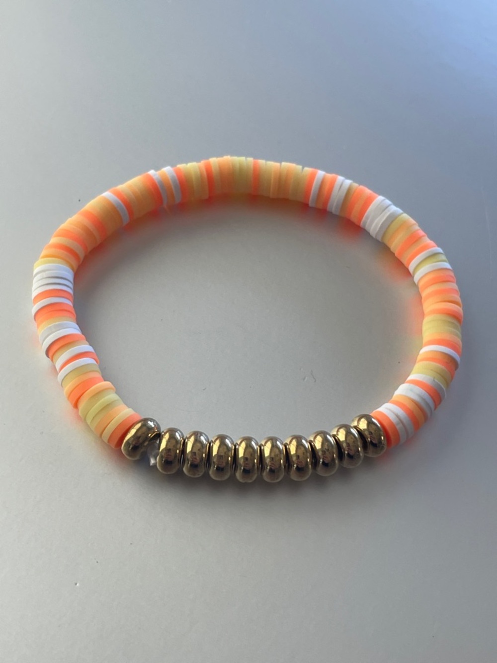 Neon Orange & White Stretch Bracelet with Gold Bead Accents
